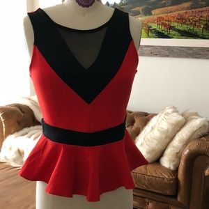 Bebe peplum top orang/ black color